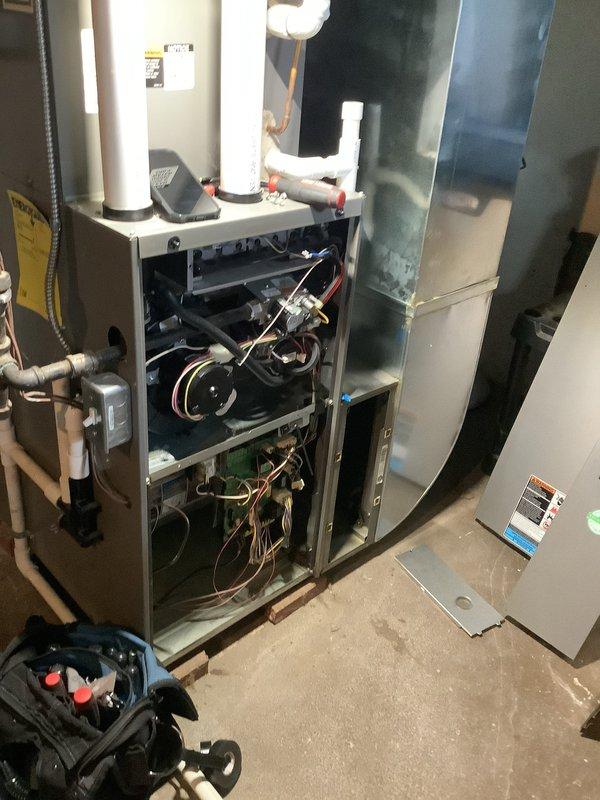 Responded to service call for thermostat displaying error code. Upon arrival, performed comprehensive system diagnostics and inspection of gas furnace and HVAC components. Verified all electrical connections, wiring harness, and control board functions while system was operational. Confirmed furnace blower motor, gas valve assembly, and safety controls were functioning within normal parameters despite error code display. Tested thermostat communication with system and found intermittent signal issue. Installed new thermostat unit to resolve error code and restore proper system communication. Verified all heating and cooling cycles operated correctly post-installation. System tested and left in proper working order with no active error codes.