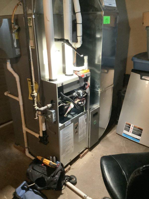 Responded to service call for thermostat displaying error code. Upon arrival, performed comprehensive system diagnostics and inspection of gas furnace and HVAC components. Verified all electrical connections, wiring harness, and control board functions while system was operational. Confirmed furnace blower motor, gas valve assembly, and safety controls were functioning within normal parameters despite error code display. Tested thermostat communication with system and found intermittent signal issue. Installed new thermostat unit to resolve error code and restore proper system communication. Verified all heating and cooling cycles operated correctly post-installation. System tested and left in proper working order with no active error codes.