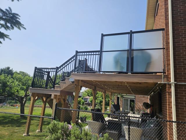 We recently had the pleasure of revisiting a valued customer who was extremely satisfied with the aluminum railings we previously installed on his beautiful deck. Impressed with our craftsmanship, he reached out to us again—this time to enhance his outdoor space with added privacy.
Our team installed four frosted tempered glass privacy panels, each measuring 72 inches high by 52 inches wide, and 6 mm thick. These panels provide both a sleek modern look and effective privacy, while still allowing soft light to filter through. The result is a stylish and functional upgrade that maintains the open feel of the deck while offering added seclusion.
We're proud to be the go-to team for repeat customers who trust us to bring their vision to life! We recently had the pleasure of revisiting a valued customer who was extremely satisfied with the aluminum railings we previously installed on his beautiful deck. Impressed with our craftsmanship, he reached out to us again—this time to enhance his outdoor space with added privacy.
Our team installed four frosted tempered glass privacy panels, each measuring 72 inches high by 52 inches wide, and 6 mm thick. These panels provide both a sleek modern look and effective privacy, while still allowing soft light to filter through. The result is a stylish and functional upgrade that maintains the open feel of the deck while offering added seclusion.
We're proud to be the go-to team for repeat customers who trust us to bring their vision to life!