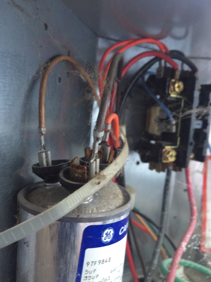 Luxaire air conditioner not cooling. Found failed capacitor, replaced part and tested operation.