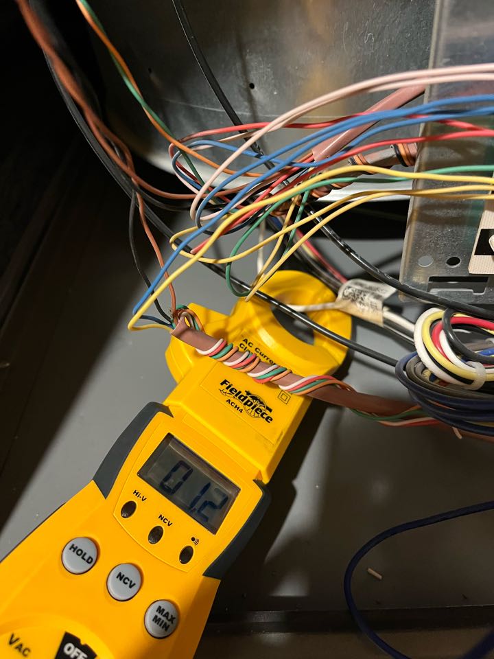 Here performing maintenance on a Lennox system in Justin Texas for our awesome customer