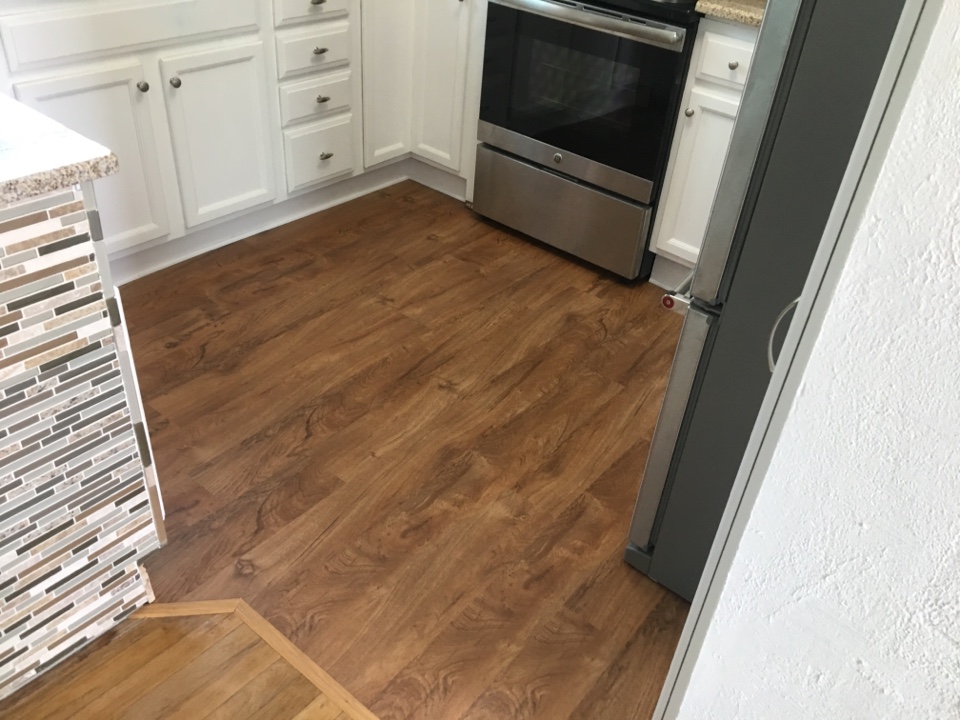 Installed vinyl plank floor in kitchen