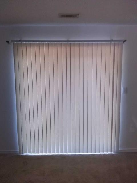 Painted the front door, replaced blinds and vertical blinds for property management company.