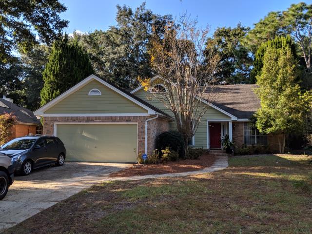 Paint exterior siding of house at gables, chimney, and garage door Paint exterior siding of house at gables, chimney, and garage door