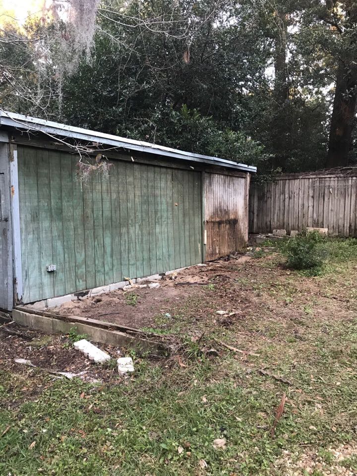 Old lean to greenhouse removed from outbuilding.