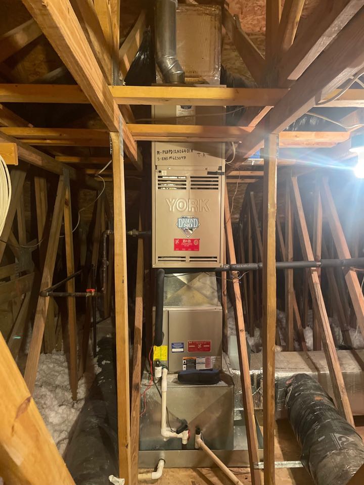 Great Falls, VA - Perform maintenance service cleaning on RHEEM gas furnace, Perform maintenance service cleaning on York downflow gas furnace
