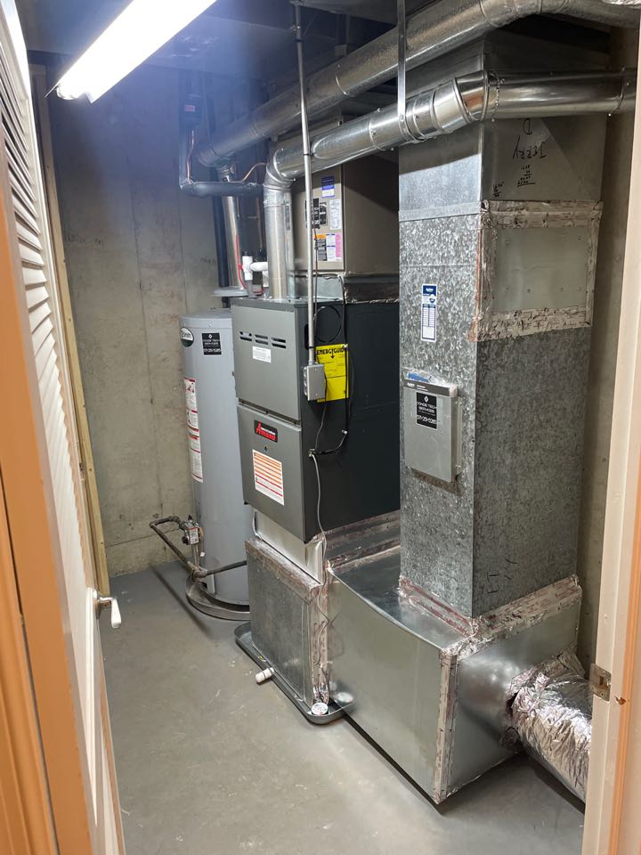 Great Falls, VA - Perform maintenance service cleaning on RHEEM gas furnace, Perform maintenance service cleaning on York downflow gas furnace
