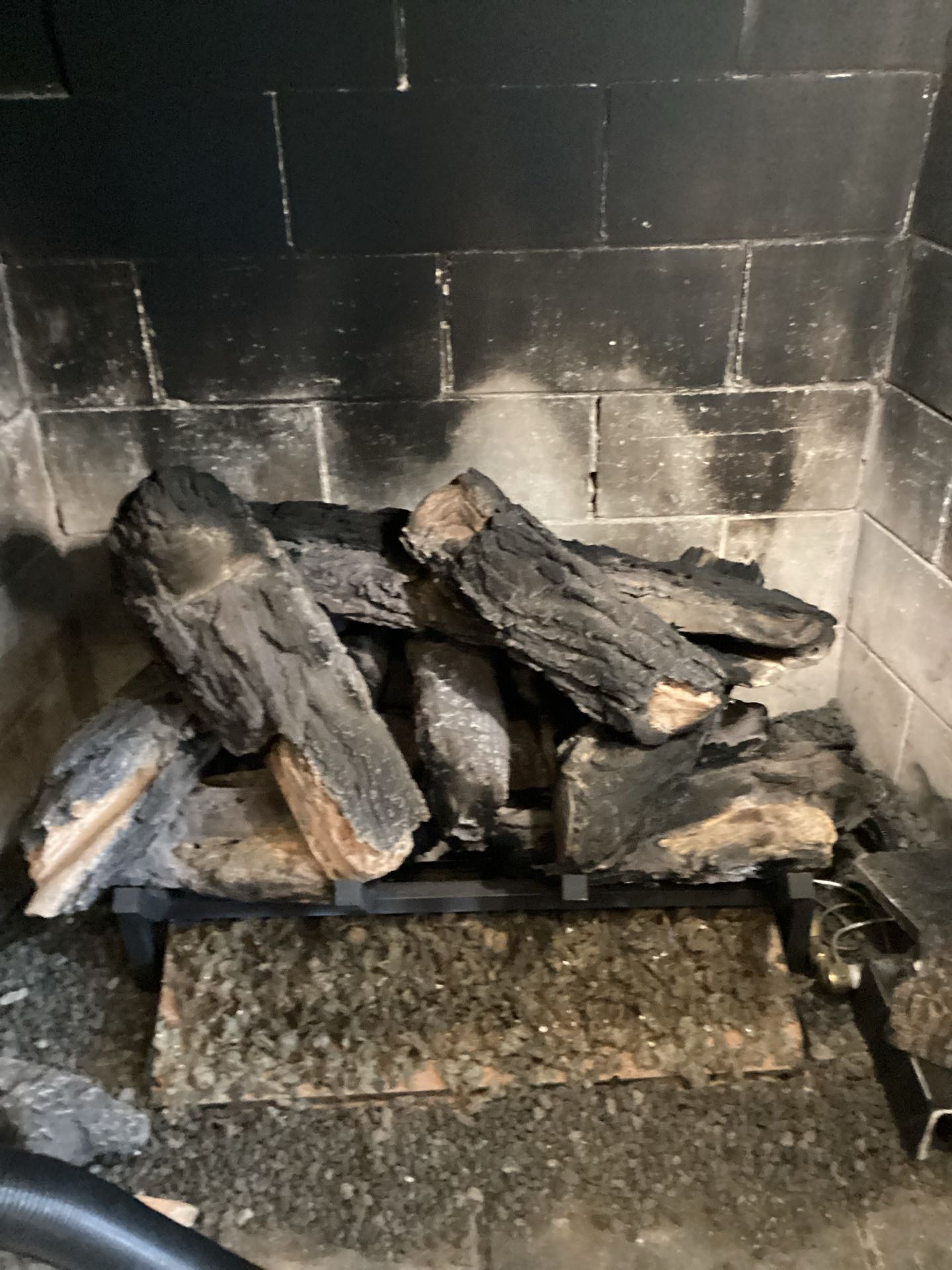 Reston, VA - As part of our comprehensive gas log fireplace maintenance service, we meticulously cleaned the Hargrove Gas Log Fireplace, ensuring all components were free from soot and debris. Our team conducted a thorough fall gas fireplace inspection, checking for any wear and tear, and verifying the safety and efficiency of the system. We also performed a detailed gas fireplace tune-up, adjusting and testing all mechanisms to ensure optimal performance. Our goal was to enhance the fireplace's longevity and safety, providing a clean and efficient heating solution for the season ahead.