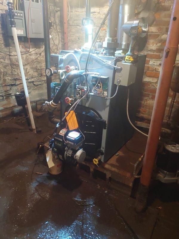Successfully completed installation of a new Weil McLain Series 6 steam boiler with Beckett burner, replacing the existing oil-fired steam boiler. Work included necessary piping repairs and connections to the existing system, ensuring proper functionality of all components including pumps, gauges, and valves.