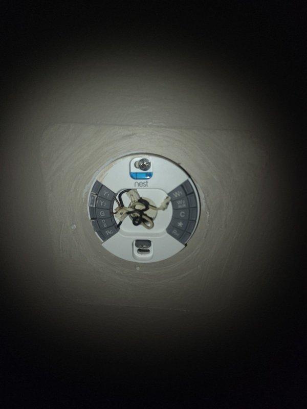 Completed assessment of 3-ton AC system that failed last summer due to damaged evaporator coil and condenser. Documented existing Nest thermostat installation and current plumbing configuration in utility area, noting signs of moisture exposure and aging connections. Provided replacement estimate for complete system.