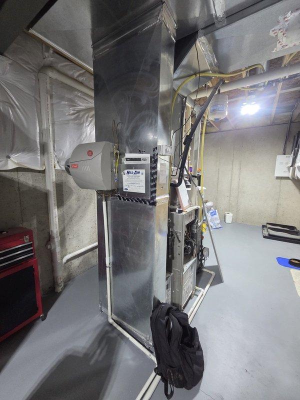 Performed inspection of non-functioning gas furnace exhibiting "no heat" condition. Diagnostic assessment revealed faulty inducer motor requiring complete system replacement. Documented existing installation configuration including Bradford White water heater, current ductwork, and ventilation setup to prepare comprehensive replacement estimate.