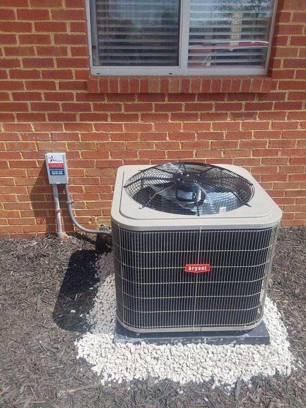 Completed full commercial HVAC system replacement including installation of Bryant Legacy 912SE60100M21 100,000 BTU gas furnace, Bryant Legacy 134SAN04800N 4-ton air conditioner with R454B refrigerant, and CVAVA4821XMA cased vertical evaporator coil. Removed existing deteriorated equipment and constructed new sheet metal return air box to replace rusted original unit with holes and structural drooping. Installed new outdoor condenser pad with gravel base for proper drainage and equipment stability, replaced electrical disconnect box with new fuses, and installed new thermostat for system control. Purged lineset with nitrogen during installation to ensure system cleanliness, reconnected all existing utility connections including drain line, gas line, and flue piping. Installed filter rack for improved maintenance accessibility and completed all electrical, refrigerant, and ductwork connections per manufacturer specifications.