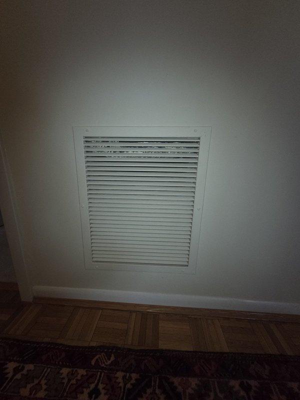 Provided comprehensive estimate for rooftop air conditioning system replacement. Evaluated existing gray condenser unit mounted on gravel ballast roof, assessed condition of equipment, support platform, electrical connections, and refrigerant lines. Documented current system specifications and return air grille configuration to determine proper replacement unit sizing and compatibility requirements.
