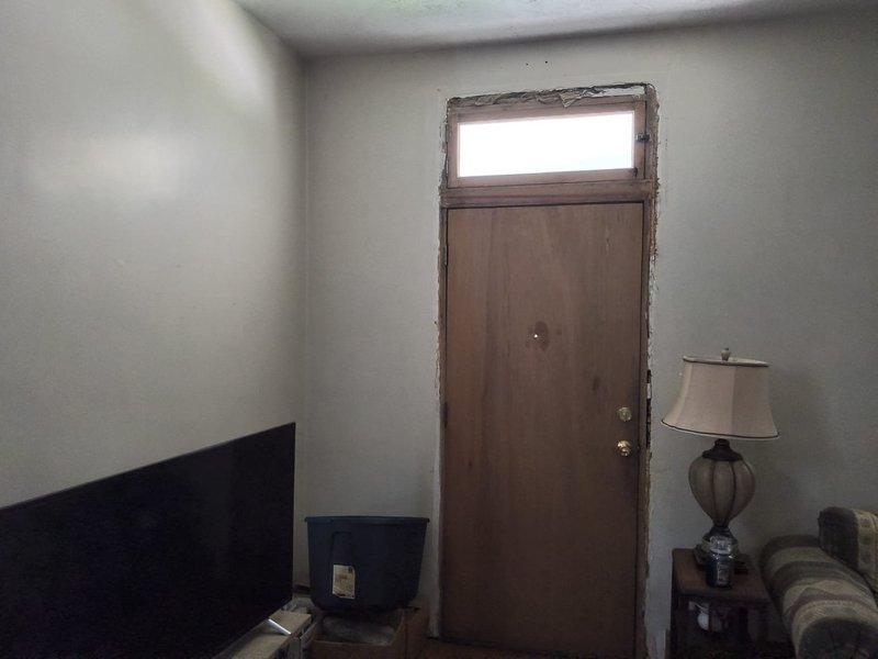 Conducted on-site evaluation for gas furnace and air conditioning system replacement. Assessed existing HVAC equipment, documented current installation location, evaluated floor register placement, and photographed interior space to determine optimal equipment configuration and installation requirements for complete system replacement estimate.