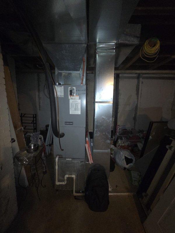 Provided estimate for complete heat pump system replacement on 13-year-old unit with failed motor causing loss of cooling capability. Assessed existing basement-mounted air handler, ductwork configuration, and electrical panel to determine replacement specifications and installation requirements.