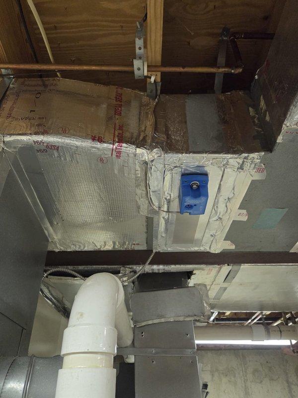 Conducted comprehensive assessment of existing HVAC system for air conditioning replacement estimate. Documented current equipment configuration including gas valve controls, electrical connections, and ductwork installation in mechanical space. Photographed control components, wiring systems, and existing duct infrastructure to provide accurate replacement specifications and equipment sizing recommendations.