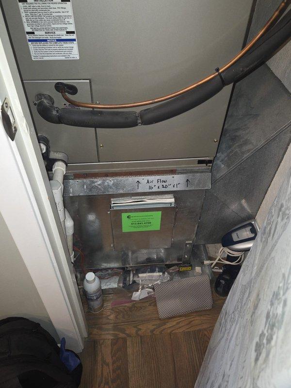 Completed full heat pump system replacement including rooftop condenser unit and indoor air handler with evaporator coil. Installed new cylindrical condenser on existing rooftop gravel surface with proper electrical disconnect boxes and control panels. Replaced indoor furnace and air handler assembly in utility closet, ensuring proper refrigerant line connections with insulated copper piping. Verified all electrical connections, secured refrigerant lines with appropriate strapping, and confirmed proper airflow direction on 16" x 30" x 1" filter access. System tested and operational upon completion.