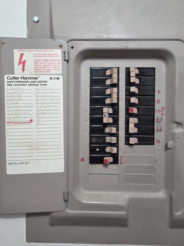 Provided comprehensive estimate for complete heat pump system replacement on 20+ year old unit experiencing low refrigerant charge and failed fan motor. Documented existing thermostat wiring configuration and electrical panel setup with photos to ensure proper compatibility and electrical capacity for new equipment installation.