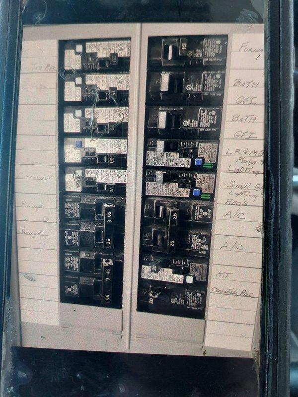 Completed full commercial HVAC system installation including Bryant GA4SAN52400 air conditioning condenser unit and BCRMA2124S3N3 ADP fan coil. Installed condenser unit on exterior gravel pad with proper mounting and positioning against brick wall. Fabricated and installed custom sheet metal ductwork to connect new fan coil to existing duct system. Installed electrical disconnect switch, whip, and fuses for both indoor and outdoor units. Wired system to existing electrical panel and labeled new circuits accordingly. Verified all electrical connections, tested system startup and operation, and confirmed proper airflow and cooling performance throughout.