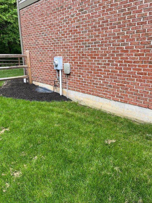 Conducted comprehensive site evaluation for geothermal HVAC system replacement at residential property. Assessed existing attic-mounted air handler unit with Honeywell Equipment Interface Module, ductwork configuration, and insulated supply lines to determine system integration requirements. Evaluated exterior electrical service capacity at meter and disconnect panel to verify adequate power supply for geothermal heat pump installation and documented site conditions for equipment sizing and placement recommendations.
