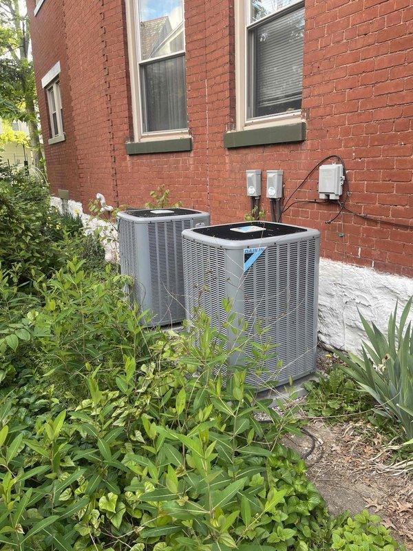 Provided estimate for complete furnace replacement on 2011 Bryant unit with failed heat exchanger. Inspected basement mechanical room and documented existing equipment condition, including exposed internal components with blower motor and compromised heat exchanger assembly. Assessed exterior HVAC system configuration with dual condensing units mounted on concrete pad against brick foundation. Presented replacement options to address safety concerns associated with cracked heat exchanger and restore reliable heating operation to the residence.