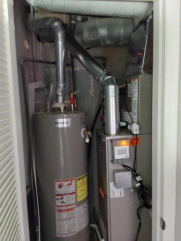 Completed full commercial HVAC system replacement including installation of Bryant GA4SAN52400N 2-ton 14 SEER condensing unit, Bryant CVAVA2414 evaporator coil, and Bryant 800SB36070 gas furnace. Removed existing equipment and disposed of all components per EPA regulations. Flushed refrigerant lines to ensure system cleanliness, installed new electrical disconnect and whip for proper power supply to outdoor unit. Fabricated and installed sheet metal transitions to connect new air handler to existing supply and return ductwork. Verified all electrical connections, tested gas furnace ignition and safety controls, and confirmed proper refrigerant charge and system operation. Obtained required permit for installation and ensured all work met local building codes and manufacturer specifications.