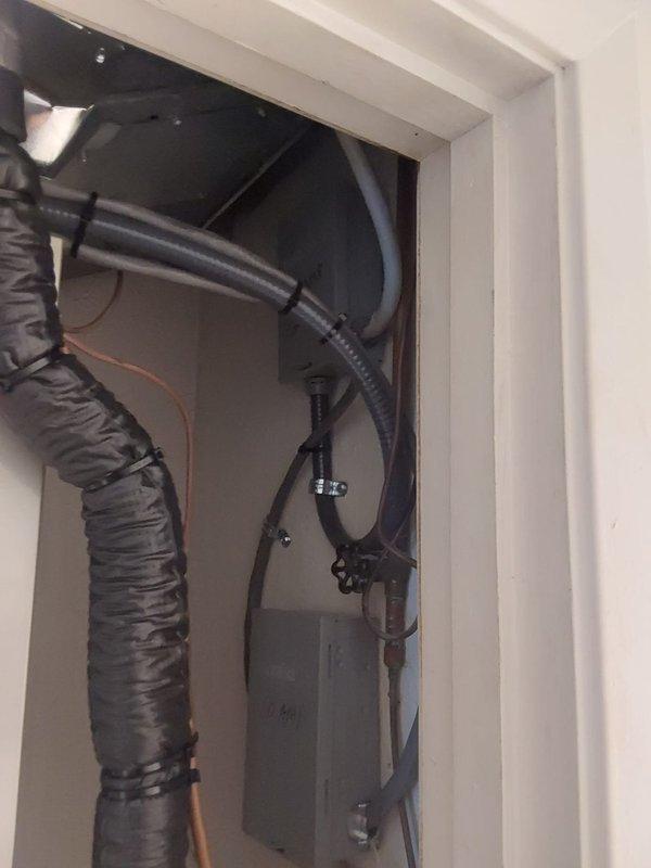 Responded to installation inspection callback for Unit #1 heat pump system to address code compliance issues. Verified that air handler installations require disconnect switches per NFPA 70 National Electric Code requirements, as units are located more than 25 feet from and not within sight of the electrical service panel. Documented that heat pump fuses need to be changed to 25A rating to meet Residential Code of Ohio specifications for proper equipment protection and code compliance.