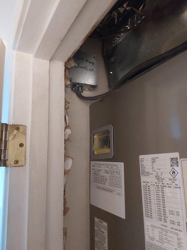Responded to installation inspection callback for Unit #1 heat pump system to address code compliance issues. Verified that air handler installations require disconnect switches per NFPA 70 National Electric Code requirements, as units are located more than 25 feet from and not within sight of the electrical service panel. Documented that heat pump fuses need to be changed to 25A rating to meet Residential Code of Ohio specifications for proper equipment protection and code compliance.