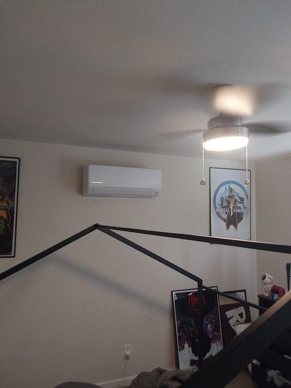 Completed commercial ductless mini-split installation consisting of one 1.5-ton Bryant outdoor condensing unit mounted on equipment pad, three Bryant high-wall indoor air handler units with individual thermostats, refrigerant line sets connecting all zones, electrical disconnect with 20A Littelfuse fuses installed at outdoor unit, and all required permits obtained. System tested and verified operational with proper refrigerant charge and airflow across all zones.