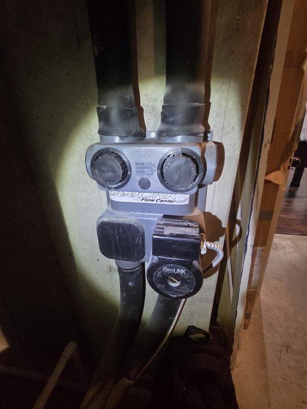 Provided estimate for complete replacement of 16-year-old geothermal heating system with failing evaporator coil. Evaluated existing Taco Flow Center hydronic distribution system with circulation pump and assessed current air handler configuration. Prepared comprehensive replacement proposal including new geothermal heat pump system, air handler unit, electrical requirements, and associated components to allow homeowner to compare repair versus replacement options.