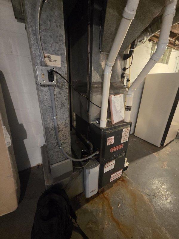Conducted estimate for complete air conditioning system replacement in small residential property. Existing AC unit from late 1980s/early 90s failed last year and requires full replacement, while existing 5-10 year old furnace remains operational and in serviceable condition. Assessed basement mechanical room installation, documented current HVAC configuration including furnace, ductwork, PVC venting system, and electrical connections to determine replacement specifications and compatibility requirements.
