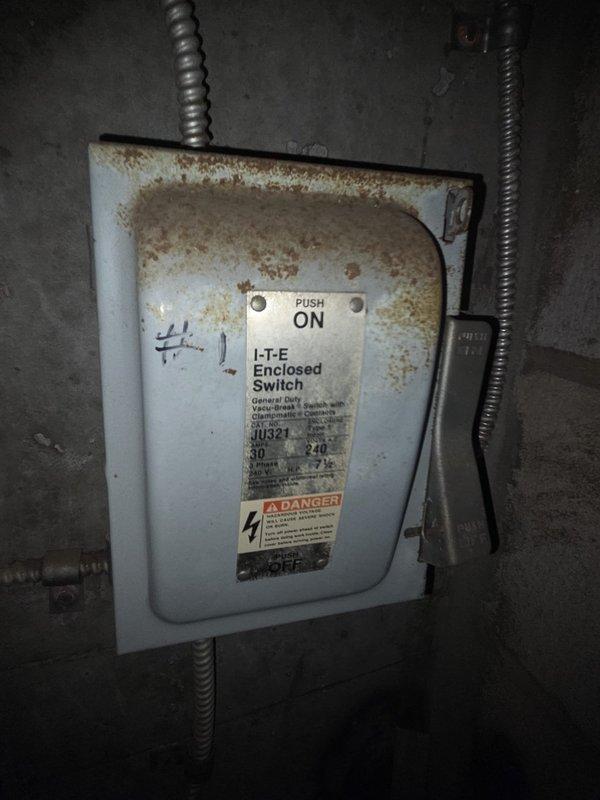 Conducted comprehensive on-site evaluation for complete HVAC system replacement. Assessed existing electrical infrastructure including main circuit breaker panel and exterior disconnect switch, documenting significant rust corrosion and deterioration on disconnect enclosure indicating moisture exposure and age-related degradation. Photographed current electrical service components to determine compatibility requirements and necessary upgrades for new equipment installation. Provided detailed replacement estimate addressing system capacity needs and electrical service modifications.