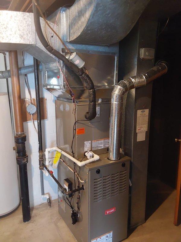 Completed full HVAC system installation including Bryant Legacy 134SAN03000N air conditioning unit with R454B refrigerant and CVAVA3017XMA V-coil cased vertical evaporator coil. Performed nitrogen flush of lineset to ensure system cleanliness, installed new outdoor equipment pad, mounted new electrical disconnect box with fuses, and integrated new equipment with existing thermostat. System tested and operational upon completion.
