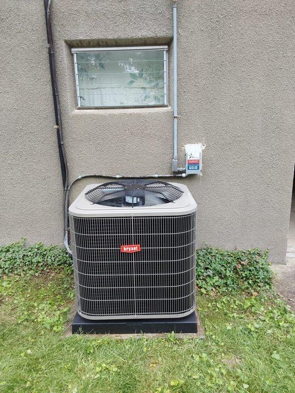 Completed full HVAC system installation including Bryant Legacy 134SAN03000N air conditioning unit with R454B refrigerant and CVAVA3017XMA V-coil cased vertical evaporator coil. Performed nitrogen flush of lineset to ensure system cleanliness, installed new outdoor equipment pad, mounted new electrical disconnect box with fuses, and integrated new equipment with existing thermostat. System tested and operational upon completion.