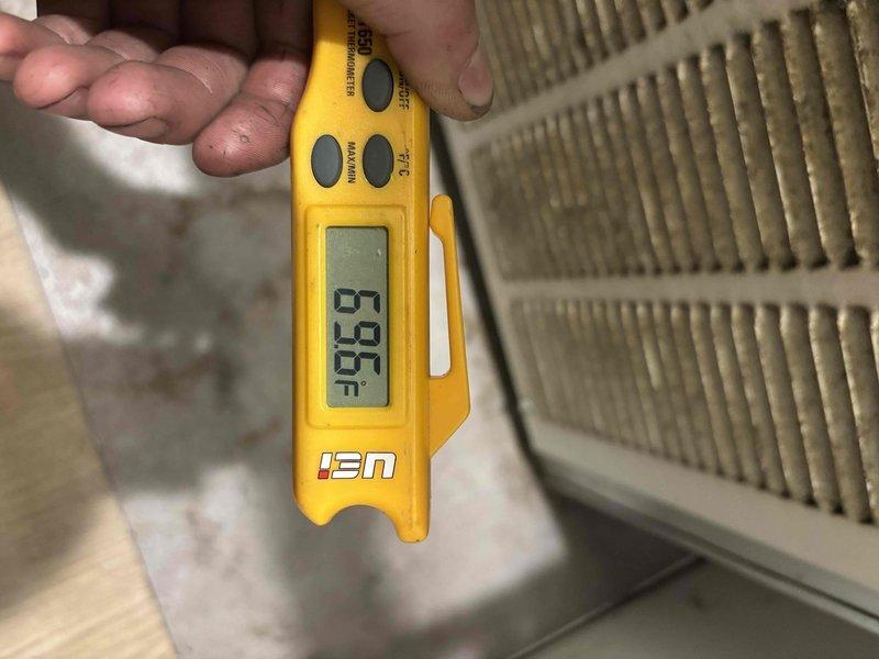 Completed flare repair on commercial HVAC refrigeration system. Performed temperature diagnostics at evaporator coil, recording supply air temperature of 48.9°F and return air temperature of 59.3°F to verify proper system operation following refrigerant line flare connection repair. System tested and confirmed operational with acceptable temperature differential across coil.