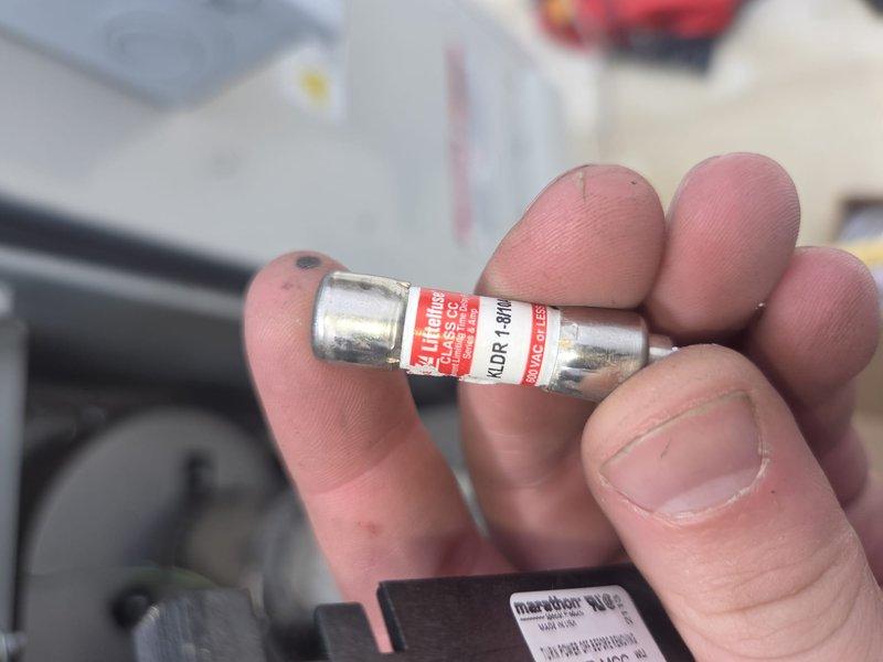 Responded to commercial rooftop unit (RTU-1) service call and diagnosed electrical issue. Upon inspection, identified failed Littelfuse KUR-1-8/10A fuse in the unit's control circuit. Replaced defective fuse with new 10-amp fuse to restore proper electrical operation and return unit to service.