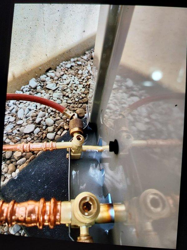 Completed full HVAC system replacement including installation of Bryant 927TA60100V21 Preferred gas furnace, Bryant 148TAN03600W 3.0-ton two-stage air conditioner with R454B refrigerant, and CVAVA3621XMA V-coil cased vertical evaporator coil. Installed approximately 30 feet of new PVC flue piping to exterior, performed nitrogen flush and pressure leak test on linesets, removed existing support poles and installed new outdoor condenser pad, and installed new disconnect box with fuses. Replaced filter rack with new filters, installed Bryant bypass humidifier with new water pads, reconnected all gas and drain lines, and installed new Ecobee thermostat to complete system commissioning.