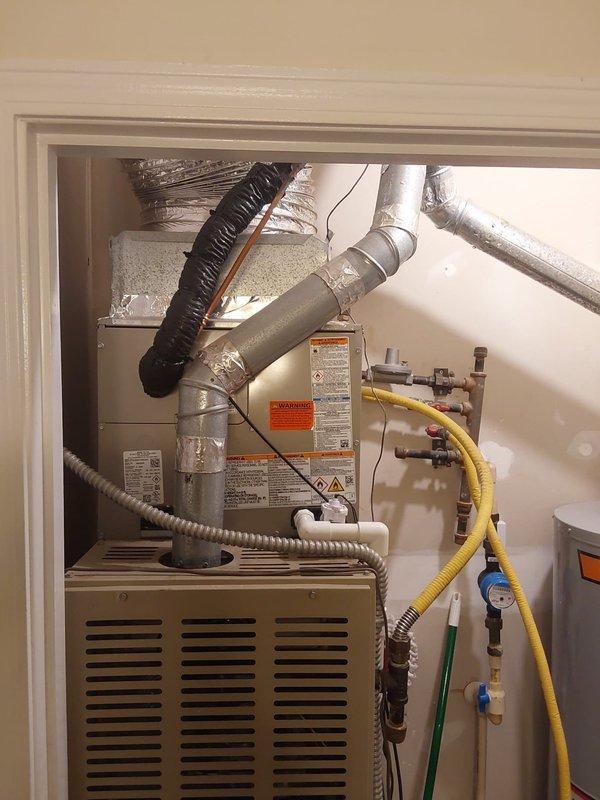 Completed commercial HVAC installation including a Bryant GA4SAN52400N 2-ton 14 SEER condenser utilizing R-454B refrigerant and CVAVA2417 evaporator coil. Flushed and reused existing refrigerant lines, fabricated sheet metal connections to existing supply and return ductwork, installed outdoor disconnect with whip and pad fuses, and obtained necessary permit for the installation.