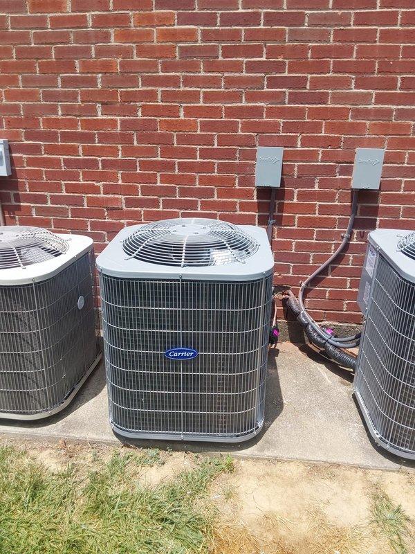 Completed commercial HVAC installation including Bryant GA4SAN52400N 2-ton 14 SEER condenser with R-454B refrigerant and CVAVA2417 evaporator coil. Flushed and reused existing refrigerant lines, fabricated and installed sheet metal transitions to connect with existing supply and return ductwork, installed outdoor disconnect with whip and pad fuses, and obtained required permit for the installation.