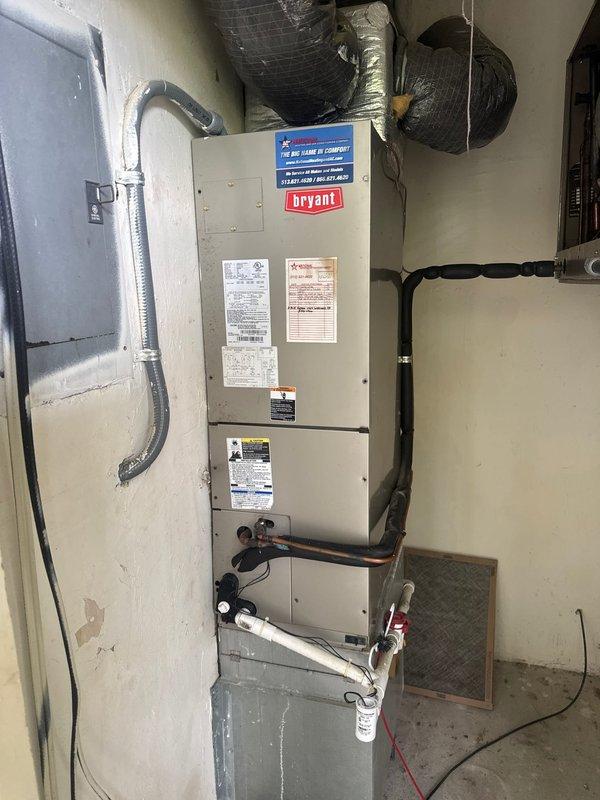 Performed complete refrigerant recovery, vacuum, and recharge procedure on commercial Bryant HVAC system. Recovered existing refrigerant from system, evacuated to proper vacuum specifications to remove moisture and contaminants, then recharged system to manufacturer specifications. Verified electrical connections at panel and furnace unit, confirmed proper operation of all components including compressor, condenser, and evaporator coil, and ensured refrigerant lines and condensate drainage were functioning correctly upon system startup.
