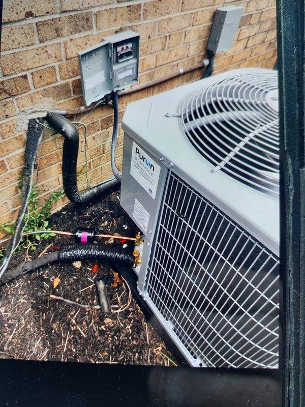 Completed full commercial HVAC system installation including Bryant FJ5ANXB24L00 air handler with 8kW electric heat pack and Bryant GA4SAN52400N 2-ton 14 SEER condenser utilizing R454B refrigerant. Fabricated and installed sheet metal connections to existing supply and return ductwork, flushed existing refrigerant lines, installed outdoor disconnect with whip and pad fuses, obtained required permit, and disposed of existing equipment per EPA specifications. Verified system operation with digital clamp meter readings and confirmed proper electrical connections at exterior disconnect box.