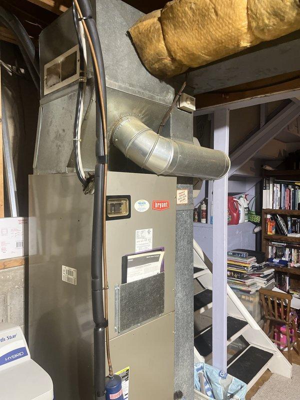 Conducted comprehensive assessment of existing Bryant heat pump system with confirmed refrigerant leak in outdoor unit. Evaluated indoor air handler located in basement mechanical area and reviewed electrical service panel for system compatibility. Provided detailed estimate for complete heat pump replacement including new outdoor condensing unit, indoor air handler, refrigerant lines, electrical connections, and thermostat controls to restore full heating and cooling functionality.