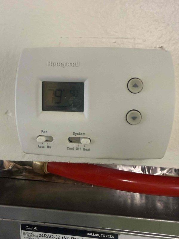 Completed full HVAC system replacement at commercial facility, installing a new Bryant 2-ton 14 SEER condensing unit with R-454B refrigerant on outdoor pad with disconnect and whip, paired with First Company hot water fan coil air handler and Honeywell thermostat. Flushed existing refrigerant lines for reuse, properly disposed of old equipment per EPA regulations, obtained necessary permits, and verified system operation upon completion.