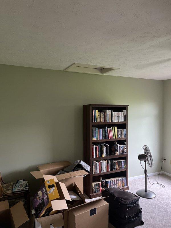 Completed estimate for air conditioning system replacement at residential property. Evaluated existing outdoor condenser unit showing signs of age and weathering, with visible algae staining on adjacent siding, and assessed indoor air handler compatibility and ductwork condition. Documented current system configuration including refrigerant line routing and electrical disconnect location, provided replacement options and recommendations for complete HVAC system upgrade.