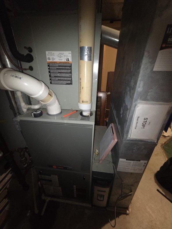 Conducted comprehensive estimate for complete HVAC system replacement of existing 2009 gas furnace and air conditioning unit. Performed thorough evaluation of current equipment condition, electrical service panel capacity, and existing ductwork configuration. Documented system specifications and installation requirements through detailed photography of furnace, condensing unit connection points, and electrical infrastructure to provide accurate replacement proposal for upgraded heating and cooling equipment.