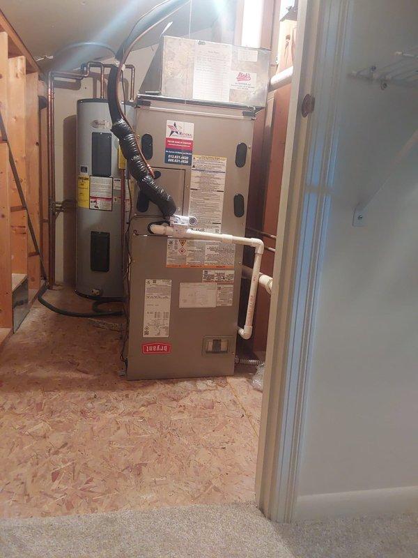 Completed full HVAC system installation including removal and disposal of existing equipment. Installed FT5ANXB24L00 fan coil with R454B refrigerant, 37MUHAQ24AA3 single-zone ductless outdoor heat pump unit, and TU-EC-08BKB 8kW electric heat kit. Installed new equipment pad, electrical whip, and disconnect at outdoor unit location. All equipment tested and operational upon completion.