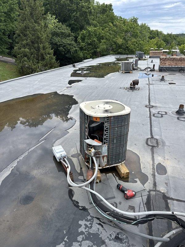 Responded to no cooling complaint on commercial rooftop HVAC unit. Upon arrival, accessed rooftop condenser unit and removed side panel to inspect internal components and refrigerant lines. Verified electrical supply at breaker panel and checked circuit breaker status to ensure proper power delivery to equipment. Diagnosed refrigerant line issue affecting cooling performance and addressed the problem to restore proper system operation.
