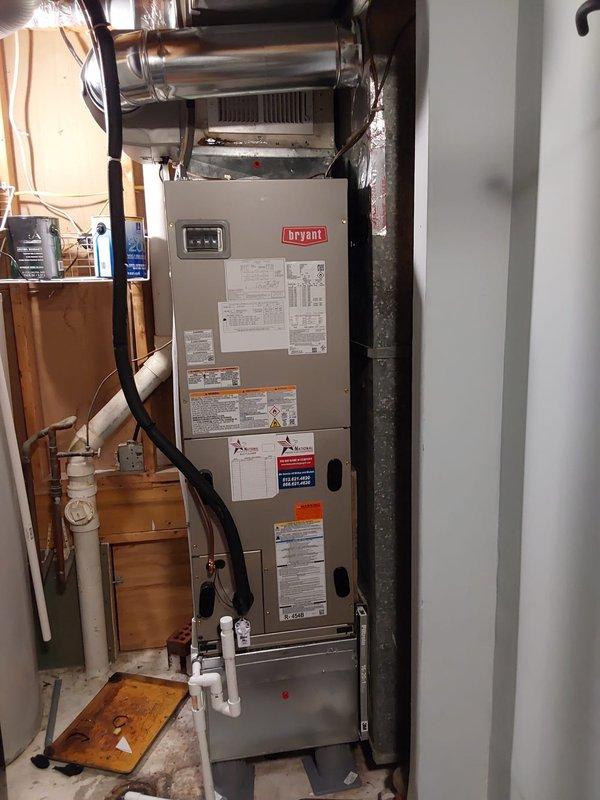 Completed full HVAC system replacement consisting of Bryant Legacy 2.5 ton heat pump system with R454B refrigerant, FJ5 multipoise fan coil with A-coil, and 15kw heat kit installation. Installed new outdoor condenser unit on concrete pad with new disconnect box and fuses. Retained existing filter rack and return drop assembly. Performed nitrogen purge of lineset followed by complete pressure leak test to verify system integrity. Installed new suction line insulation throughout refrigerant piping. Upgraded thermostat to Bryant Ecobee 3 with Intelisense Lite Pro WiFi capabilities for enhanced system control and monitoring. Installed new condensate pump with safety switch. All electrical connections completed to code with proper wire sizing and circuit protection. System startup performed with refrigerant charge verified, airflow balanced, and all safety controls tested for proper operation. Unit operating within manufacturer specifications upon completion.