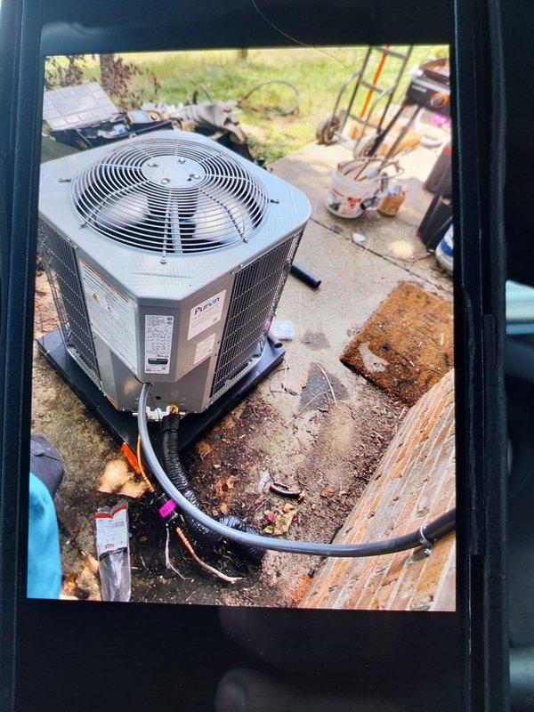 Completed full commercial HVAC system installation including Bryant 2-ton 14 SEER condensing unit with R-454B refrigerant and First Company hot water fan coil air handler. Flushed existing refrigerant lines, installed outdoor disconnect with pad and whip, obtained necessary permits, and disposed of old equipment per EPA regulations, with system tested and verified operational upon completion.