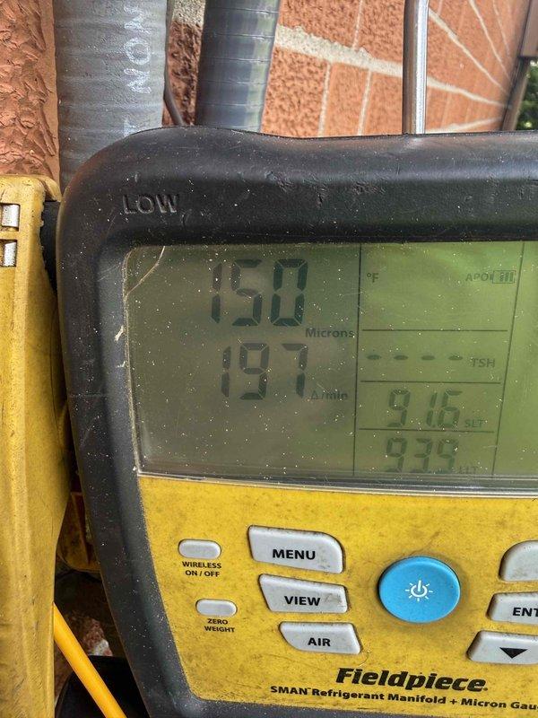 Completed full HVAC system installation consisting of a 4.0-ton single-stage air conditioner (Model 146SAN04800W) utilizing R454B refrigerant and a matching fan coil unit (Model FT5ANXC48L00) with R454B compatibility. System was installed in utility space with proper ductwork connections, refrigerant lines were evacuated to proper micron levels as verified by digital manifold gauge readings, and system was charged to manufacturer specifications and tested for proper operation.